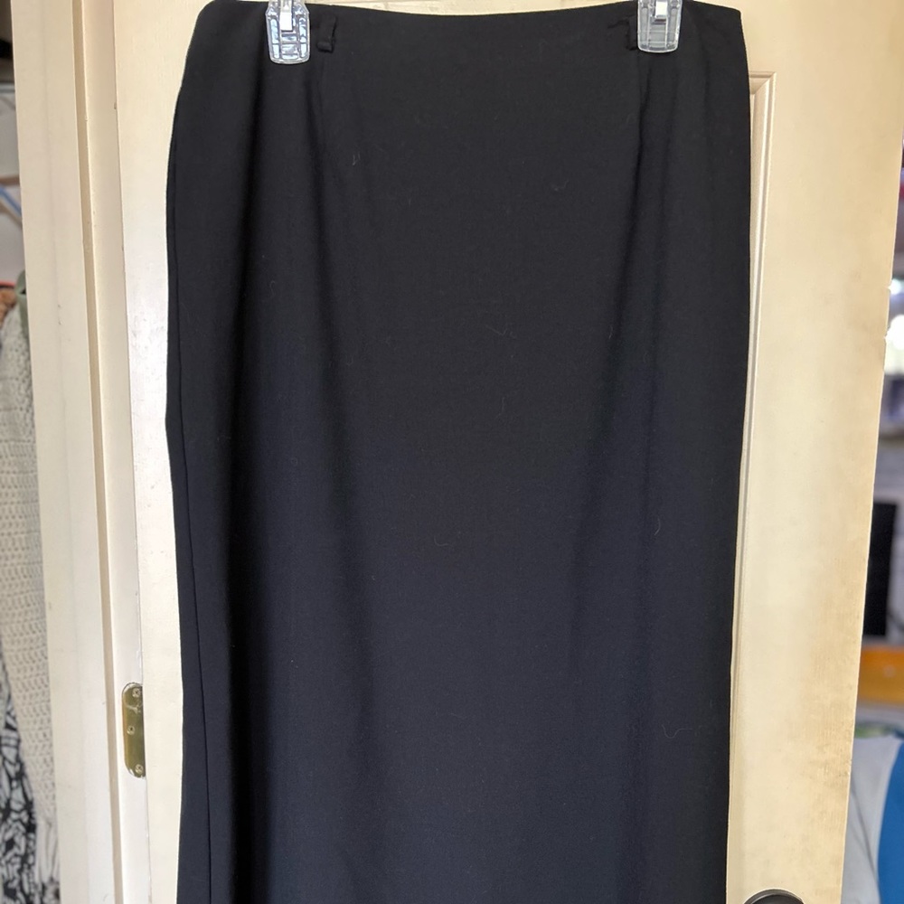 Ladies size 14 calf length black skirt with slit up back, zipper closure
